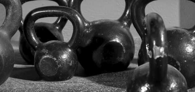 Kettlebells weights in a workout gym in black and white