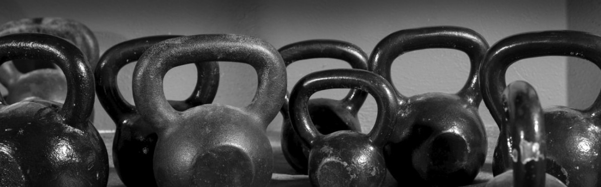 Kettlebells weights in a workout gym